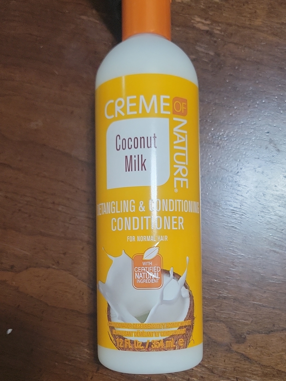 Creme of nature detangling and conditioning conditioner with coconut milk